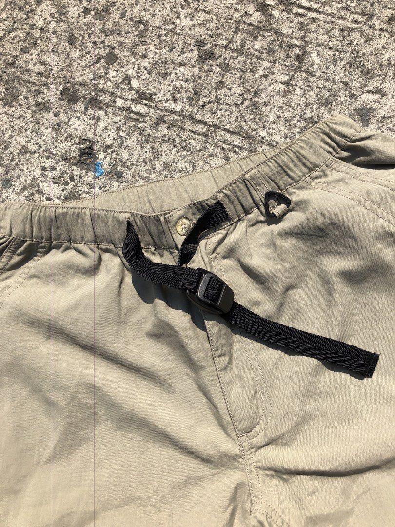 Hiking pants (Category: Activewear) located in Caloocan City. Submitted by thriftniotep. (Listing ID 1448015319, Image 3). Description: - Khaki hiking pants - Zip-off legs convert to shorts - Elastic waistband with drawstring and buckle - Multiple zippered pockets (front and back) - Adjustable toggles at the ankles - Ideal for outdoor adventures.