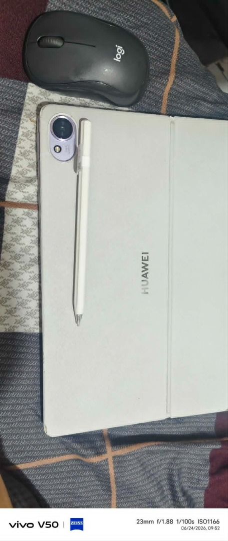 Huawei Tablet with Keyboard and Stylus (Category: Android) located in Manila. Submitted by siredzelsa30772 (Listing ID 1447889222, Image 3). Description: - Purple Huawei Tablet - 256GB Storage (61% Used) - White Keyboard Included - Stylus Included - Logitech Mouse Included - Ideal for Work and School Huawei Papermate Type RS: Additional Funds for OFW application .