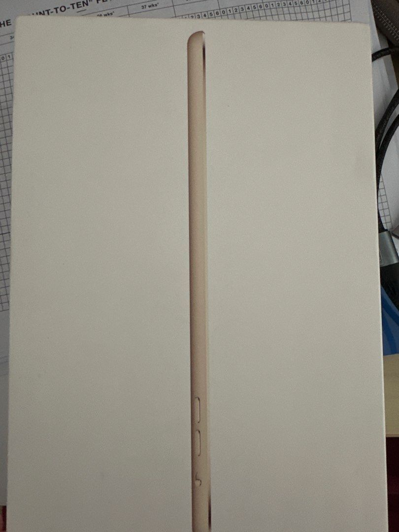 (Category: iPad) located in Singapore. Submitted by talljuice (Listing ID 1447921887, Image 2). Description: - Apple iPad Mini - 128GB Storage - Gold Color - Wi-Fi + Cellular Model - Retina Display - 4G LTE Support - Includes Original Box, USB Cable, and Power Adapter - Ideal for On-the-Go Use.