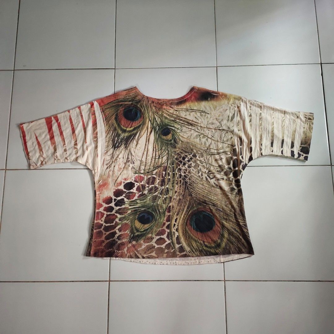 Jess & Jane Peacock Feather Burnout Tunic Top (Category: Shirts) located in Antipolo. Submitted by capa_rison (Listing ID 1447957550, Image 2). Description: Reminder: **Colorrate: 100/100 **Condition rate: 100/100 "Lightly used condition" **No issue **Very Presentable Category: Women's Tops & Tshirts Top Style: Kimono Top Sleeves Length: Elbow Occasion: Casual Measurements: chest 22" waist 21" hem 23" shoulder 20" neck open 9" sleeves cuff open 8