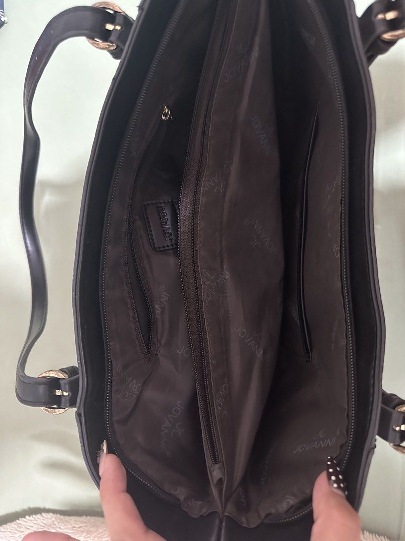 JOVANNI Monogram Tote Bag (Category: Tote Bags) located in Antipolo. Submitted by soshops (Listing ID 1448020102, Image 3). Description: Very Well Used. Measurements: Length: 14-17 inch Height: 11 inch - Interior includes a zippered compartment and slip pockets. - Accented with elegant gold-tone hardware. - Ideal for everyday use and errands..
