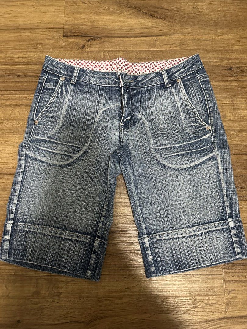 Kashieca Denim Shorts Size 31 (Category: Shorts) located in Mandaluyong City. Submitted by miaaaa32 (Listing ID 1448009023, Image 1). Description: - Kashieca denim shorts - Size 31 - Blue wash with a faded, distressed look - Cuffed hems - Inner lining with a red and white floral pattern - Ideal for everyday casual wear.
