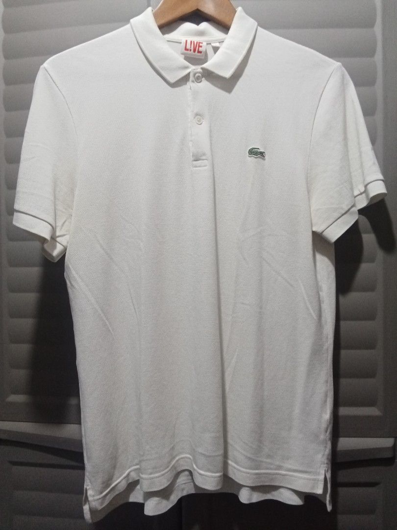 Lacoste Live White Polo Shirt (Category: Tshirts & Polo Shirts ) located in Makati City. Submitted by kuysman (Listing ID 1447932741, Image 1). Description: only sensible questions are entertained 1 left actual measurement 21 x 27".
