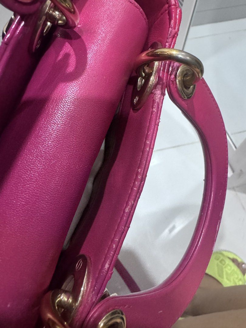 Lady Dior Pink Leather Mini Handbag (Category: Luxury Bags & Wallets) located in Imus. Submitted by pguecs (Listing ID 1447921081, Image 2). Description: For Sale: Authentic Pink Leather Dior Lady Dior Mini Bag with Gold Hardware. Minor signs of wear on edges and handles (as pictured). Comes with dustbag and entrupy authentication. Selling for only 65k due to its condition. Guaranteed authentic or your money back. RFS: need funds for new home pro