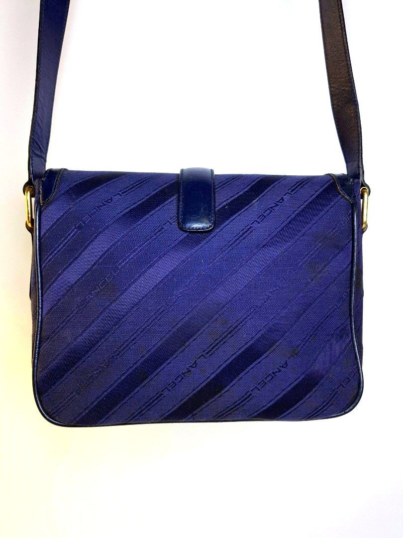 Lancel Paris Vintage Monogram Canvas Shoulder Bag (Category: Luxury Bags & Wallets) located in Pasay City. Submitted by onick_79 (Listing ID 1448072866, Image 2). Description: Lancel Paris Vintage Monogram Canvas Shoulder Bag - Jacquard monogram canvas with genuine leather trim - Deep navy blue with gold-tone hardware - Flap design with signature L buckle and magnetic closure - Spacious interior for daily essentials - Dimensions: 24 × 18 × 8 cm.