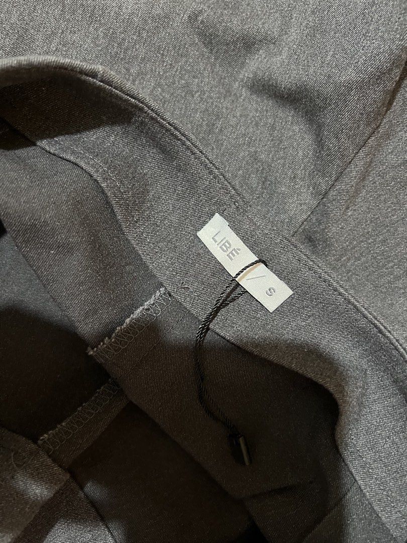 LIBE VIETNAM Grey Skort Size S (Category: Other Bottoms) located in Cabuyao City. Submitted by declutter_w_mee (Listing ID 1447921231, Image 2). Description: - LIBE grey skort - Size S - Textured blend fabric - Button closure - Front left pocket - Perfect for casual or dressed-up occasions.