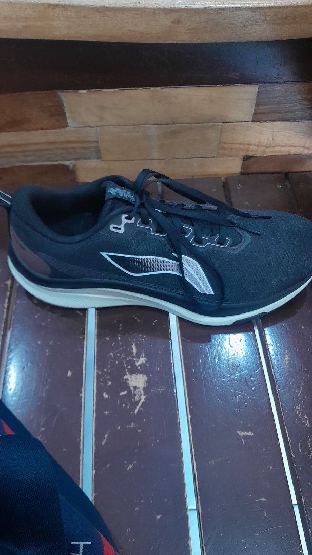Li-Ning Running Shoes Black (Category: Sneakers) located in Subic. Submitted by adamdwyane (Listing ID 1447941311, Image 2). Description: - Brand: Li-Ning - Color: Black - Features: Lightweight and breathable mesh upper, good sole grip - Ideal for: Running and everyday wear - Condition: Shows some signs of use, but plenty of life left.