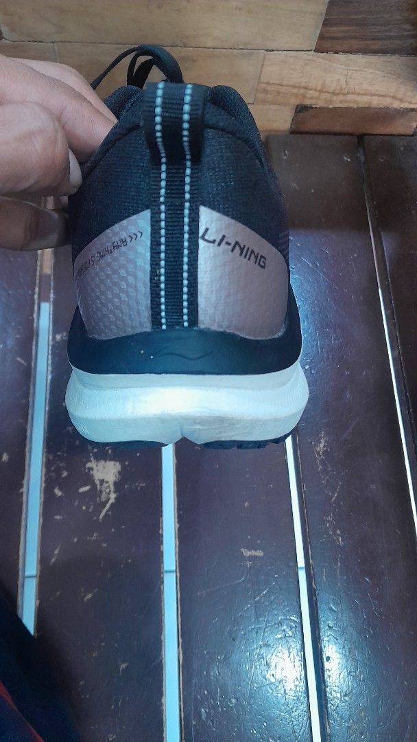 Li-Ning Running Shoes Black (Category: Sneakers) located in Subic. Submitted by adamdwyane (Listing ID 1447941311, Image 3). Description: - Brand: Li-Ning - Color: Black - Features: Lightweight and breathable mesh upper, good sole grip - Ideal for: Running and everyday wear - Condition: Shows some signs of use, but plenty of life left.