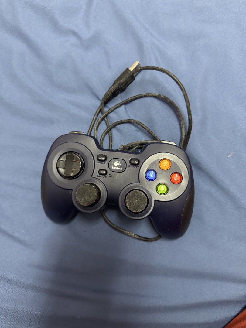Logitech Game Controller USB Wired (Category: Controllers) located in Kuala Lumpur. Submitted by nraisha_ (Listing ID 1448058566, Image 1). Description: - Logitech USB wired game controller - Perfect for PC gaming - Includes directional pad, analog sticks, and action buttons - Easy USB connection - Ready for your next gaming adventure.