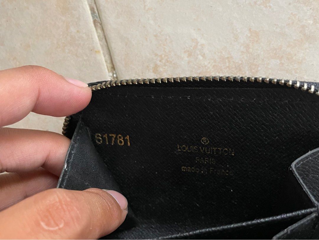 Louis Vuitton Monogram Coin Pouch (Category: Luxury Bags & Wallets) located in Siniloan. Submitted by rethr1ft (Listing ID 1447908855, Image 3). Description: - Louis Vuitton Coin Pouch - Classic Monogram Pattern (Black & Beige) - Secure Zipper Closure - Interior Date Code: S1781 - Made in France - Compact and Portable: Fits easily in pockets or bags - Ideal for organizing coins or small essentials.