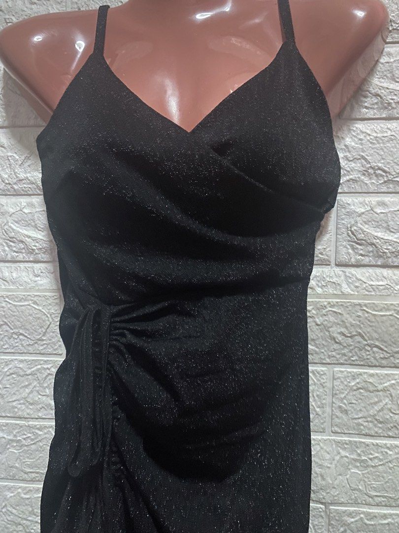 Luxury Trap Black Glitter Wrap Mini Dress Small-Medium (Category: Dresses) located in Paranaque City. Submitted by ChloeCharles (Listing ID 1448031849, Image 3). Description: Spaghetti straps, shimmery fabric, side tie for adjustable fit Features a flattering V-neck, adjustable side tie, and subtle glitter detail. Stretchy fabric. Perfect for parties, birthdays, or nights out .