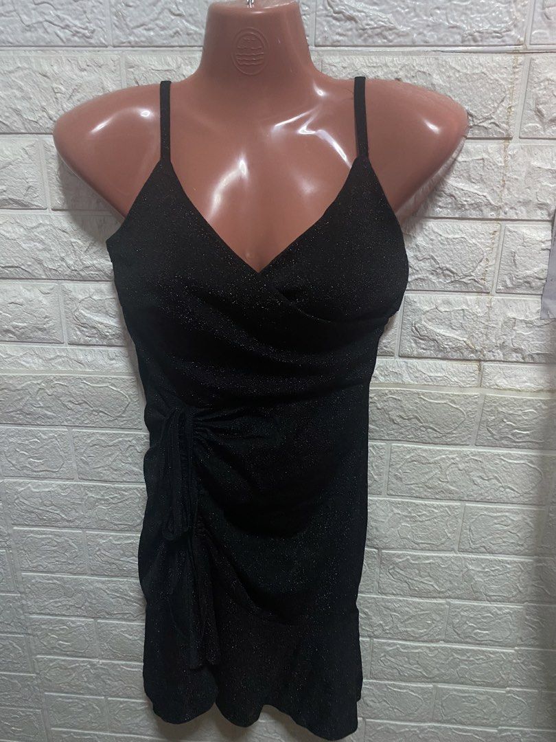 Luxury Trap Black Glitter Wrap Mini Dress Small-Medium (Category: Dresses) located in Paranaque City. Submitted by ChloeCharles (Listing ID 1448031849, Image 1). Description: Spaghetti straps, shimmery fabric, side tie for adjustable fit Features a flattering V-neck, adjustable side tie, and subtle glitter detail. Stretchy fabric. Perfect for parties, birthdays, or nights out .