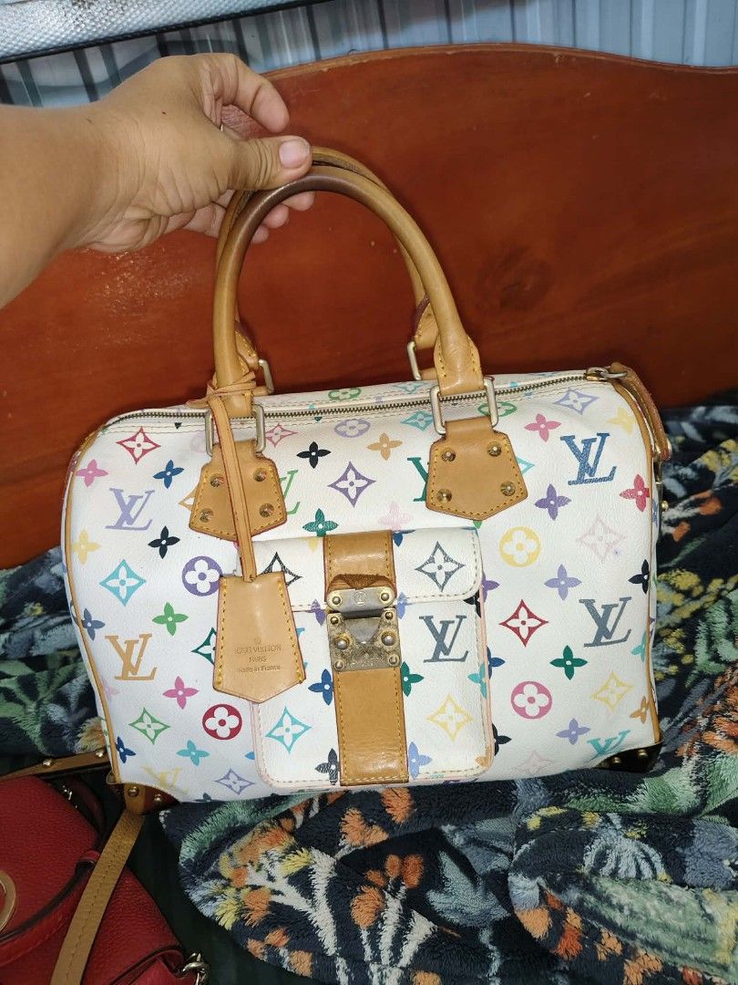 LV multicolor (Category: Luxury Bags & Wallets) located in Manticao. Submitted by jiachloeyana (Listing ID 1447946874, Image 2). Description: in excellent condition no issue intact piping malinis in and out.