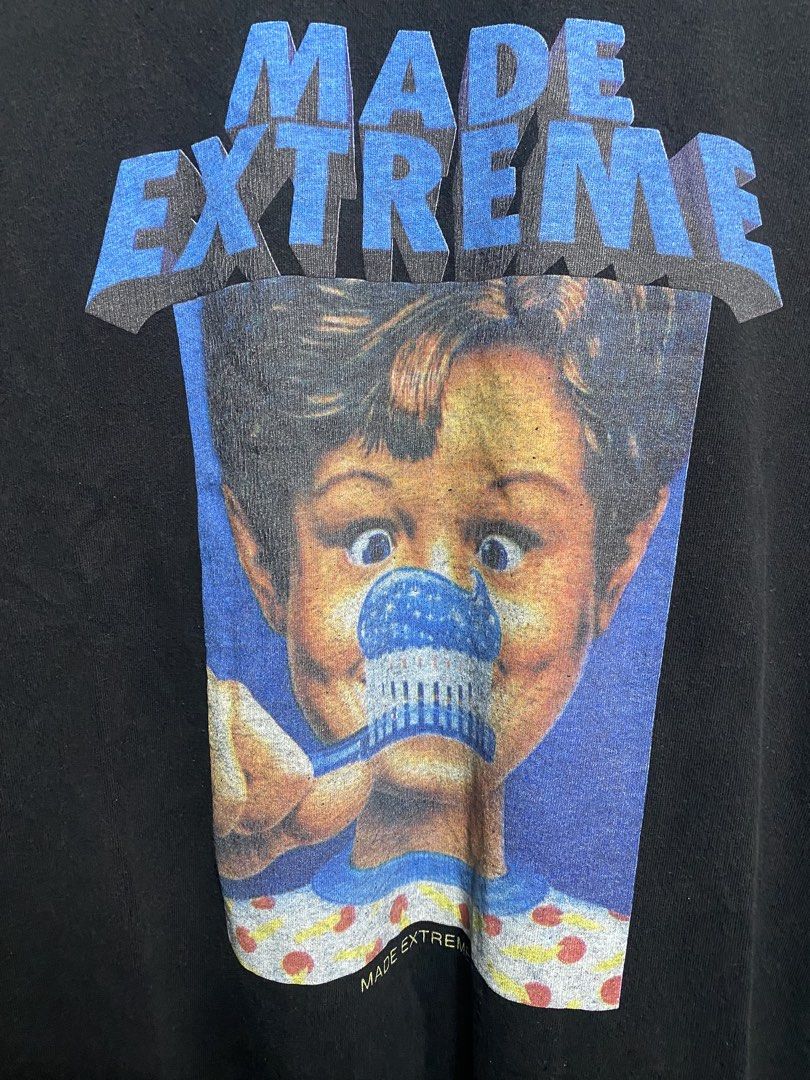 MADE EXTREME Graphic T-Shirt (Category: Tshirts & Polo Shirts ) located in Naga. Submitted by thesource4400 (Listing ID 1447927253, Image 3). Description: - Brand: MADE EXTREME - Color: Black - Size: Tag says M (fits like M) - Design: Graphic print on front and back with brand name and toothbrushing theme - Condition: Good for casual wear.