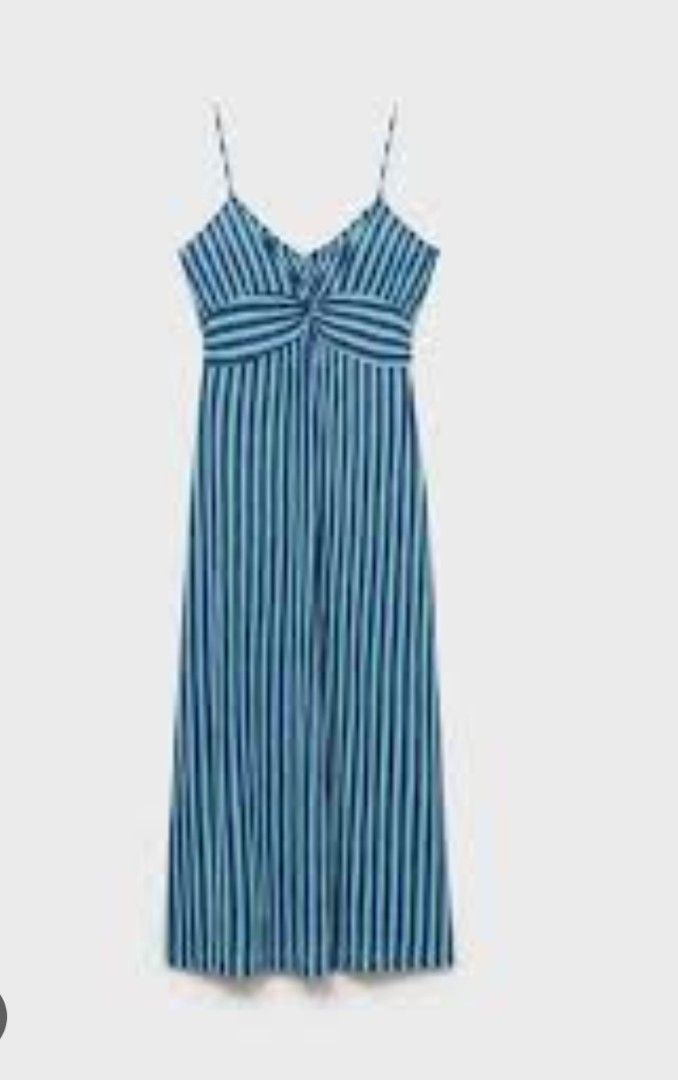 Mango Blue Striped Midi Dress with Twist Front (Category: Dresses) located in Davao. Submitted by sachigo (Listing ID 1447963934, Image 3). Description: - Stylish blue and white stripe midi dress - Features a flattering twist detail at the bust - Delicate thin spaghetti straps - Hemline falls below the knee - Versatile for casual days or beach vacations - Effortless to wear and style.