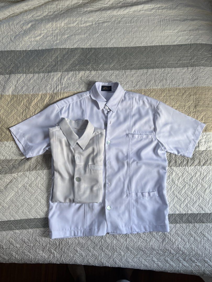 Men's Med School Uniform Top & Pants Set (Category: Formal Shirts) located in Quezon City. Submitted by mrtymrts (Listing ID 1447911766, Image 3). Description: Take all Medical School Uniform (Men's) Polo: - SIZE: M - 8 pcs - all buttons intact, except for one (top button is missing; see picture) - two different brands (4 pcs from Mcline Design; other 4 unknown/generic) Slacks / Pants - 32 waistline - 7 pcs - all zippers and clasps are intact. - 