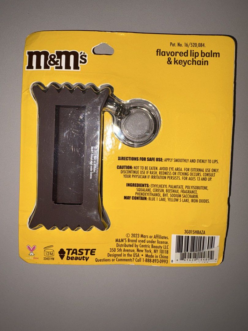 M&M lip balm and keychain (Category: Character Goods) located in Quezon City. Submitted by jennybug (Listing ID 1447890939, Image 2). Description: M&M lip balm and keychain Never used Still in original package.