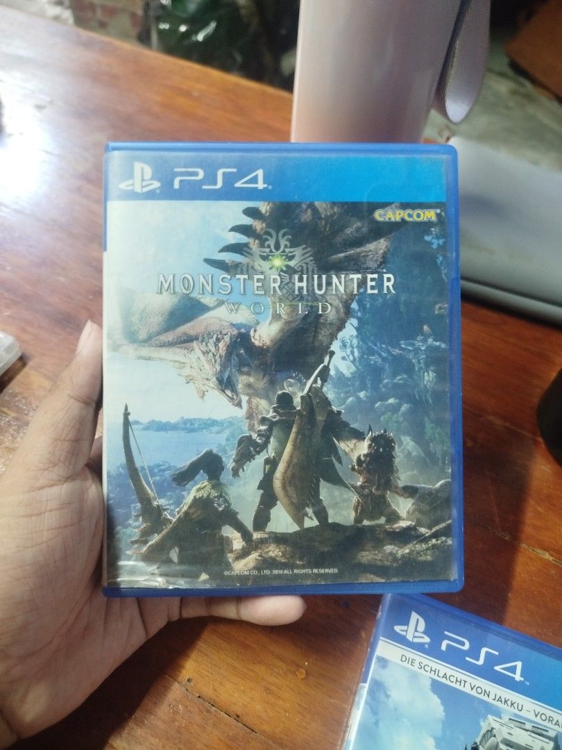 Monster Hunter World PS4 Game (Category: PlayStation) located in Binan City. Submitted by pumpkiiin02 (Listing ID 1447947573, Image 1). Description: - Monster Hunter World for PS4 - Includes original case and cover art - Explore a vast world and hunt massive monsters - Perfect for action RPG fans - Enjoy solo or with friends.