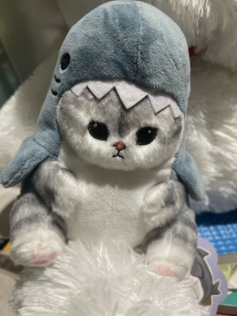 Morifand Cat Shark Plush Toy (Category: Plushies & Soft Toys) located in Muntinlupa City. Submitted by joanofarc1013 (Listing ID 1447938507, Image 1). Description: - Adorable cat plushie dressed in a cute shark costume. - Made with super soft and cuddly material. - Features the original Morifand tag. - Approximately 6 inches tall. - Ideal for collectors or as a thoughtful gift..