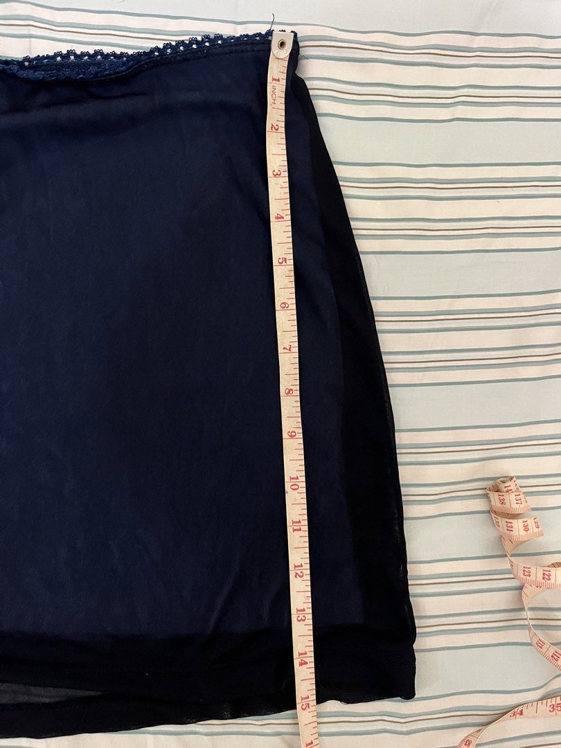 Navy blue mini skirt (Category: Skirts) located in Tuguegarao City. Submitted by declutterf (Listing ID 1447962814, Image 3). Description: Flowy mini skirt.