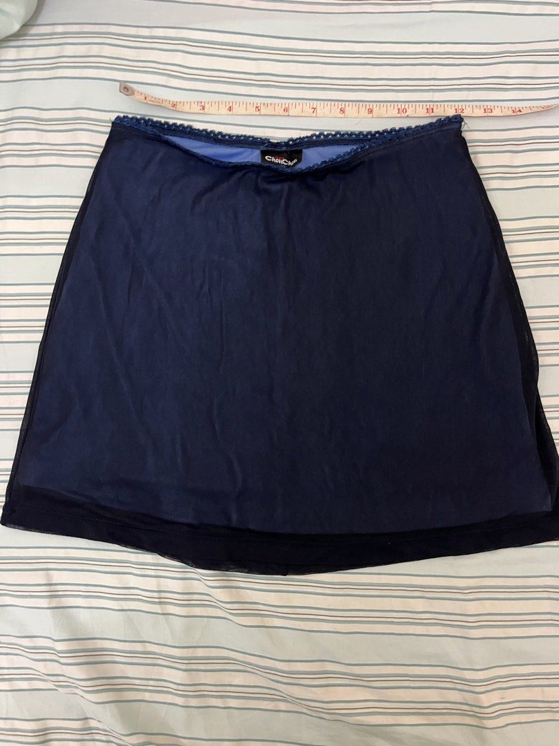 Navy blue mini skirt (Category: Skirts) located in Tuguegarao City. Submitted by declutterf (Listing ID 1447962814, Image 1). Description: Flowy mini skirt.