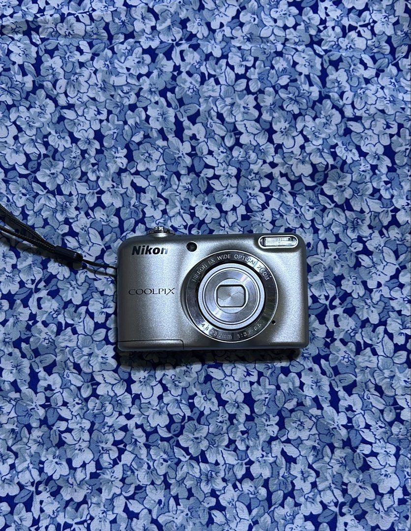 RUSH‼️Nikon Coolpix Digital Camera (Category: Cameras) located in Manila. Submitted by new_saichay (Listing ID 1447892186, Image 1). Description: NIKON COOLPIX L29 ✨Silver color ✨Screen: 2.7 LCD 🛍️INCLUSIONS ✅Unit,Strap,SD card,AA batteries with charger CAMERA APPEARANCE -9/10 body cosmetics -has super mild LCD burn (doesn’t affect the output) 📝FIRST PAY BASIS MOP:CASH OR GCASH MOD: J&T/MEET UP 📝 ✅ Free delivery around El Salvador or CDO meetu