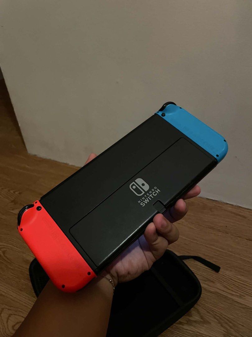 Nintendo switch oled (Category: Nintendo) located in Manila. Submitted by all.love.thrift.shop.v2 (Listing ID 1447958365, Image 2). Description: For sale! Nintendo Switch OLED 64GB internal storage Minimal scratches due to normal use, but 100% working and does not affect gameplay. Inclusions: 64GB microSD NBA 2K24 game card Complete accessories (original charger, dock, Joy-Con straps, and pouch) PM for more details.