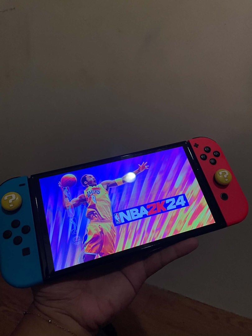 Nintendo switch oled (Category: Nintendo) located in Manila. Submitted by all.love.thrift.shop.v2 (Listing ID 1447958365, Image 3). Description: For sale! Nintendo Switch OLED 64GB internal storage Minimal scratches due to normal use, but 100% working and does not affect gameplay. Inclusions: 64GB microSD NBA 2K24 game card Complete accessories (original charger, dock, Joy-Con straps, and pouch) PM for more details.