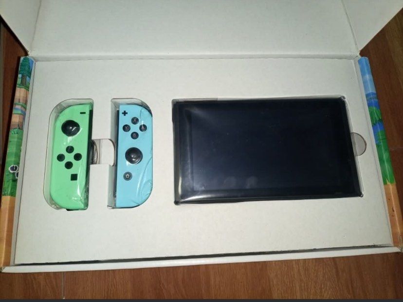 Nintendo Switch Special Edition Animal Crossing Console (Category: Nintendo) located in Trece Martires City. Submitted by garciaverm13676 (Listing ID 1448072392, Image 2). Description: - Special Edition Animal Crossing Nintendo Switch console - All original packaging and manuals are present Price is negotiable.