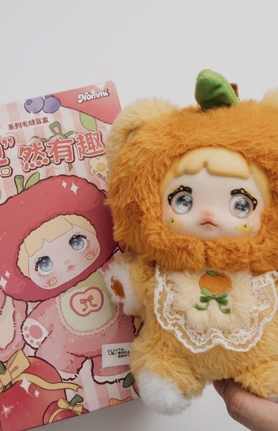 Nommi V3 Orange - Fruity Series (Category: Designer & Blind Box Toys) located in Cavite. Submitted by eirawr (Listing ID 1448031481, Image 1). Description: -Originally bought for 679 -No flaws and damage, clean as well -Never been used as a pendant, just displayed -Comes with original box, card, and key ring .