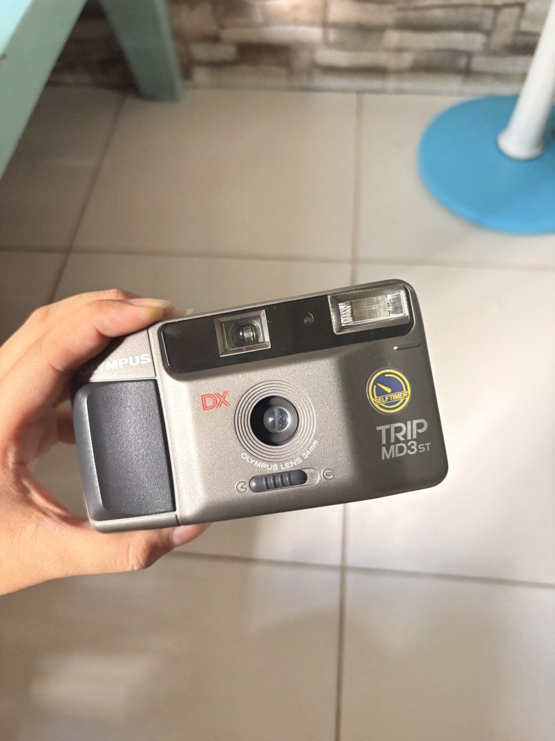 Olympus Trip MD3 (Category: Cameras) located in Manila. Submitted by cholo09 (Listing ID 1447979778, Image 1). Description: Olympus Trip MD3 - No scratches at all - Working - Tested with film roll - Includes camera pouch and batteries NO ISSUES! Message me for sample pics! Perfect for those vintage collectors Price is slightly negotiable!.