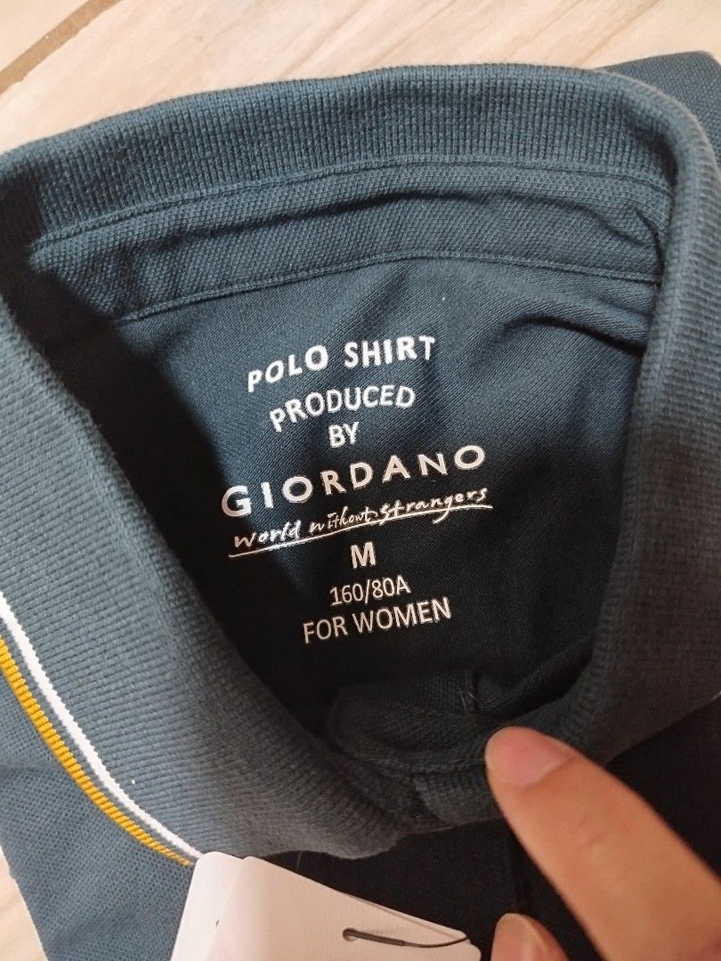 [ORIGINAL] Giordano Polo Shirt (Category: Shirts) located in Antipolo. Submitted by _mtoc7 (Listing ID 1447890903, Image 3). Description: - Brandnew with tags - Giordano dark green polo shirt - Women's size M - Embroidered deer logo - 96% cotton 4% lycra -Very soft and comfy! ✨ - Ideal for casual and semi-formal wear -color is unique, almost black/navy/hint of green 😊 pwede pang regalo 🧡.