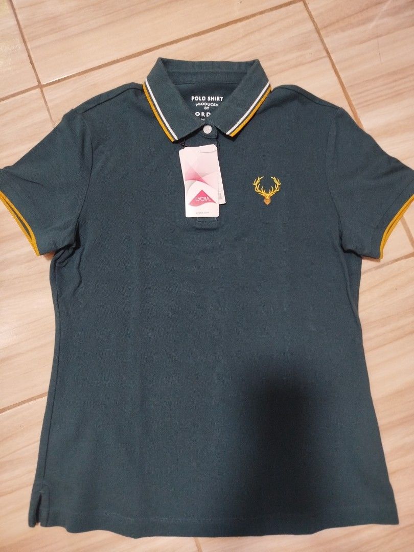 [ORIGINAL] Giordano Polo Shirt (Category: Shirts) located in Antipolo. Submitted by _mtoc7 (Listing ID 1447890903, Image 2). Description: - Brandnew with tags - Giordano dark green polo shirt - Women's size M - Embroidered deer logo - 96% cotton 4% lycra -Very soft and comfy! ✨ - Ideal for casual and semi-formal wear -color is unique, almost black/navy/hint of green 😊 pwede pang regalo 🧡.