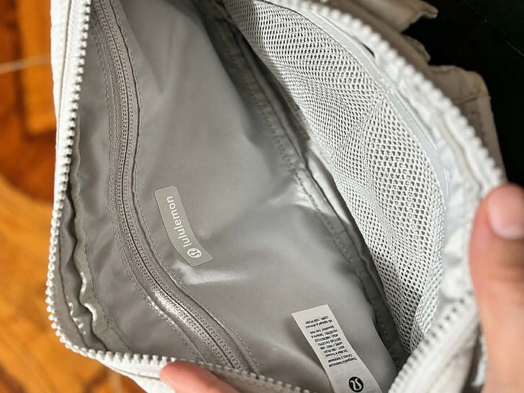 Original Lululemon Crossbody Bag White Opal (Category: Cross-body Bags) located in Calauan. Submitted by thatchic_8 (Listing ID 1447945525, Image 3). Description: (PRICE NEGOTIABLE) ✔ 100% Authentic ✔ Adjustable strap ✔ Multiple pockets and compartments ✔ Clean interior ✔ Zippers and magnetic closures working properly ✔ Good overall condition ✔ Minimal signs of use (please refer to photos) Perfect for daily errands, travel, gym, and casual outfit
