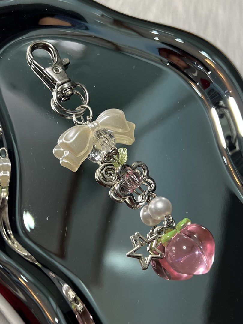 Peach Charm, Keychain, Bag Charm, Anik anik (Category: Charms) located in Marikina City. Submitted by mikashisells (Listing ID 1447898947, Image 1). Description: • Brand New • Hand crafted 📌 Mode of payment : Gcash / Bank Transfer 📌 Pay as you order (PAYO) 🚚 Can ship thru: * Lalamove (same day shipment) * J&T (1-3 days shipment) - with ₱21 off voucher 🤝 Meetup: • Graceland Plaza, Marikina City • Gateway Mall, Cubao (by schedule) 📍 Location: 