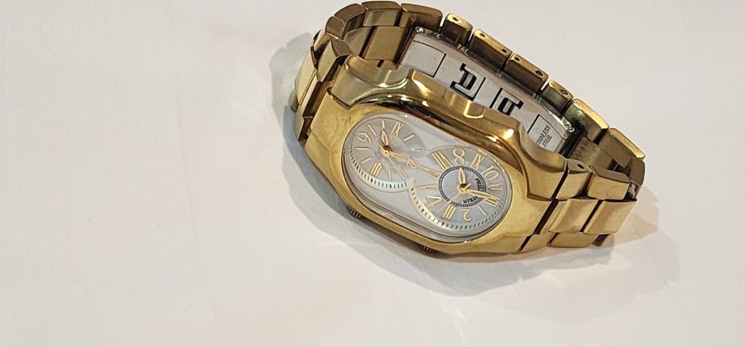 Philip Stein Gold Chrono Watch (Category: Women's Watches) located in Butuan. Submitted by sofiaharmonie (Listing ID 1448003858, Image 2). Description: - Philippines Stein Gold Chrono Small Watch Unique oval-shaped gold watch - Features two separate dials: one with Roman numerals, one with Arabic numeral - Stylish metal link strap - Ideal for tracking two time zones or as a fashionable accessory no box.