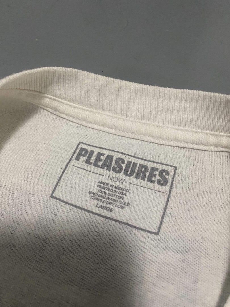 Pleasures Now "Germ Free Passion" Graphic Tee (Category: Tshirts & Polo Shirts ) located in Santa Rosa. Submitted by stop_n_sh0p (Listing ID 1447922003, Image 3). Description: - Brand: Pleasures Now - Graphic: 'Germ Free Passion' on front, 'Pleasures Now' text on back - Material: 100% Cotton - Origin: Made in Mexico - Size: Large.