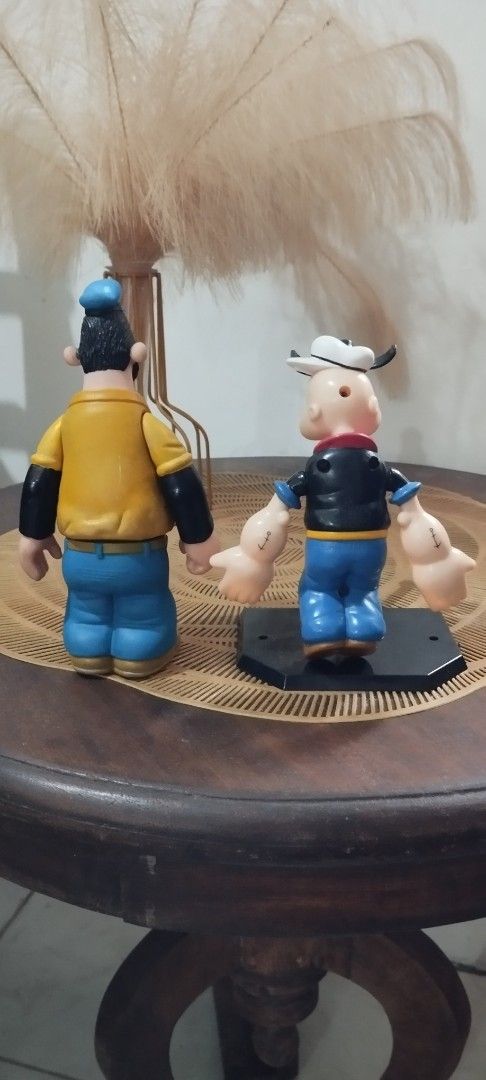 Popeye & Bluto Action Figures Set (Category: Figurines & Statues) located in Manila. Submitted by ventajetoyz625 (Listing ID 1447937157, Image 3). Description: - Set of Popeye and Bluto action figures - Bluto- 1991 Jollibee Popeye- 1970's KFS Robin - Base stand not included - Ideal for collectors and fans of the classic cartoon - With paint scratch on Bluto - What you see is what you get.