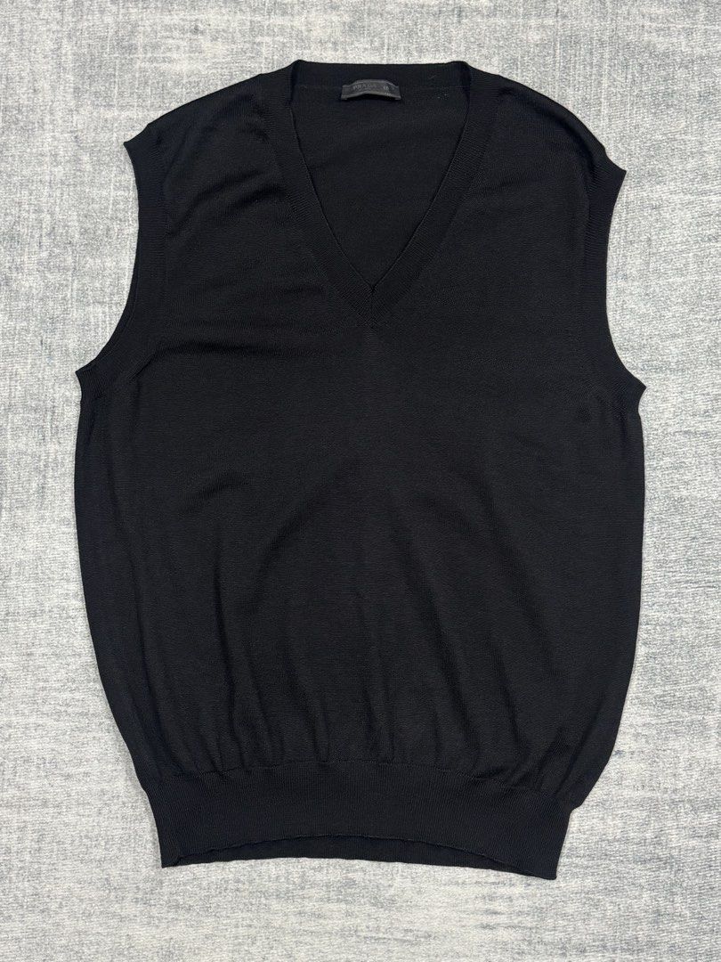 Prada - Sweater Vest - 100% Wool (Category: Vests) located in Manila. Submitted by members-only (Listing ID 1448024241, Image 2). Description: Prada Sweater Knit Vest Size: 50 Fits: Medium men's Dimes: 19 x 26-27 100% Wool Very good condition No issue 💯Guaranteed authentic.