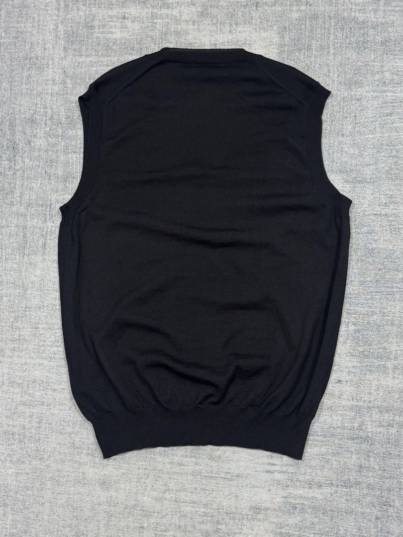 Prada - Sweater Vest - 100% Wool (Category: Vests) located in Manila. Submitted by members-only (Listing ID 1448024241, Image 3). Description: Prada Sweater Knit Vest Size: 50 Fits: Medium men's Dimes: 19 x 26-27 100% Wool Very good condition No issue 💯Guaranteed authentic.