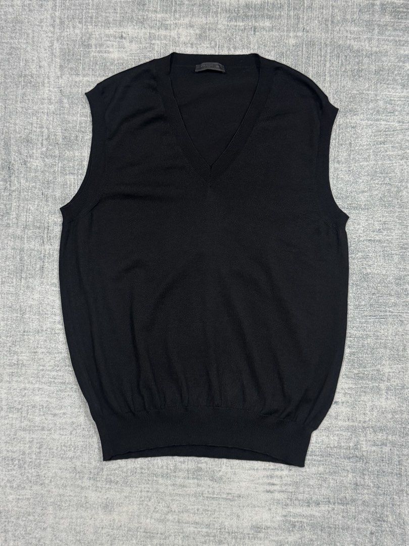 Prada - Sweater Vest - 100% Wool (Category: Vests) located in Manila. Submitted by members-only (Listing ID 1448024241, Image 1). Description: Prada Sweater Knit Vest Size: 50 Fits: Medium men's Dimes: 19 x 26-27 100% Wool Very good condition No issue 💯Guaranteed authentic.