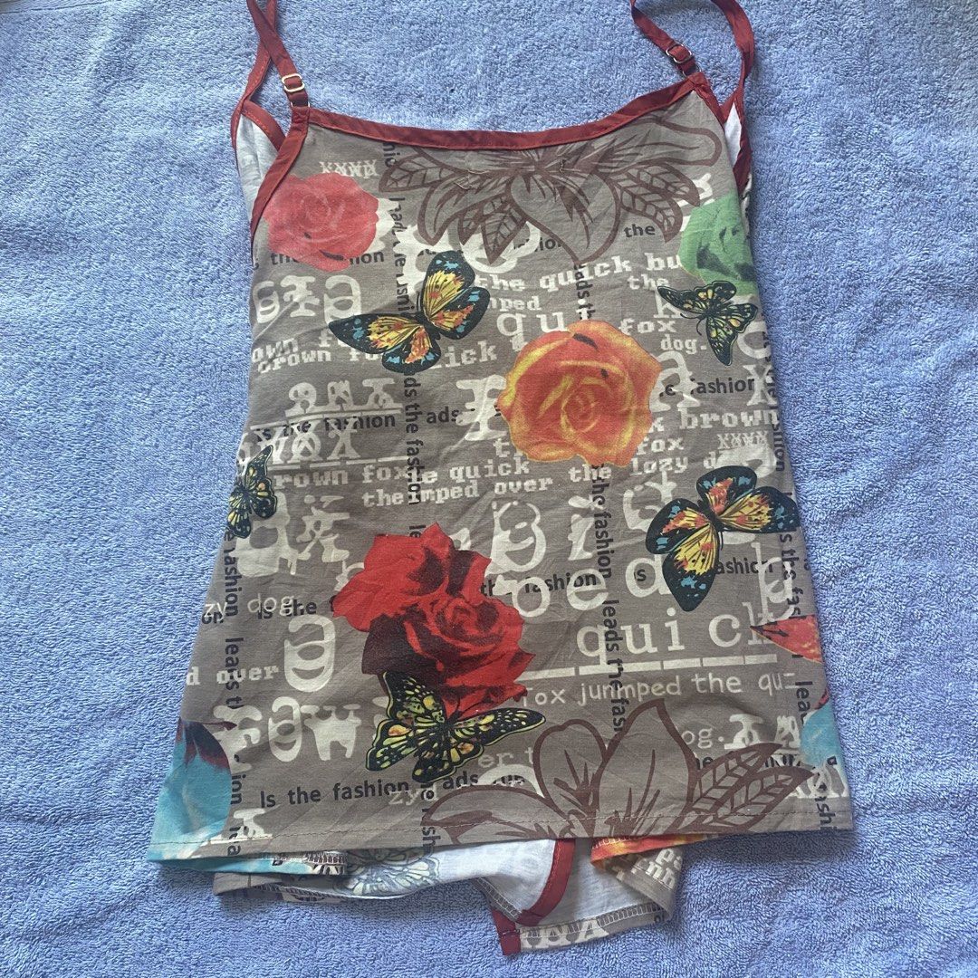 Printed Wrap Top (Category: Sleeveless) located in Taguig. Submitted by floatingpoints (Listing ID 1447931431, Image 2). Description: best fit medium RFS: not my style anymore loc: qc/taguig mop: gcash only mod: j&t or lalamove (within mm) pls manage your expectations since these are all preloved, unless tagged as bnwt :).