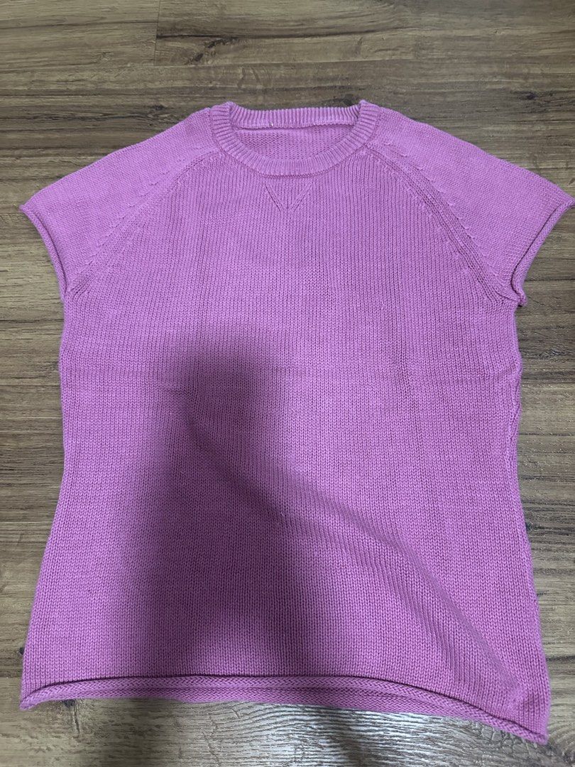 Purple Short Sleeve Knit Sweater (Category: Longsleeves) located in Mandaluyong City. Submitted by miaaaa32 (Listing ID 1448009024, Image 1). Description: - Casual purple knit sweater - Short sleeves with raglan detail - V-neck collar - Textured knit fabric - Versatile for layering or standalone wear - Easy to pair with jeans or skirts.