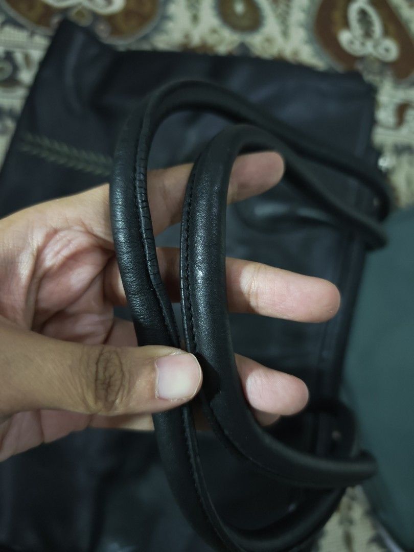 Radley Black Leather Tote Bag (Category: Tote Bags) located in Kulim. Submitted by fortheloveofthrifts (Listing ID 1447969629, Image 3). Description: Black leather tote bag from Radley. Spacious interior with a zip closure. Comfortable shoulder straps. Great for everyday use or work. Plenty of life left in this classic bag. Reference: Laptop is 13in, laptop sleeve 14in. Bag can fit up to 15 or 16in laptop.