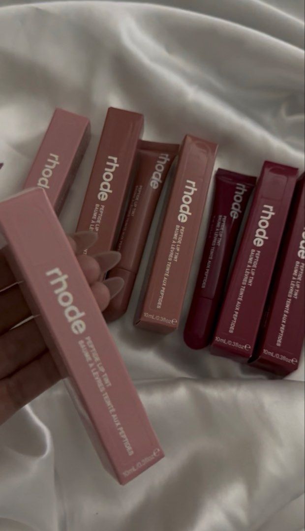 Rhode Peptide Lip Tint Balm - Various Shades (Category: Makeup) located in Manila. Submitted by amara898 (Listing ID 1447983638, Image 2). Description: - Rhode Peptide Lip Tints (tinted lip balms) - Available in multiple shades - Size: 10ml / 0.33oz each - Ideal for everyday wear.