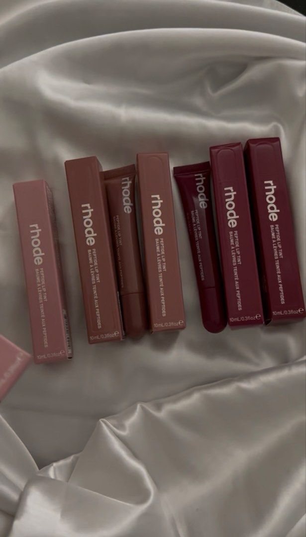 Rhode Peptide Lip Tint Balm - Various Shades (Category: Makeup) located in Manila. Submitted by amara898 (Listing ID 1447983638, Image 3). Description: - Rhode Peptide Lip Tints (tinted lip balms) - Available in multiple shades - Size: 10ml / 0.33oz each - Ideal for everyday wear.