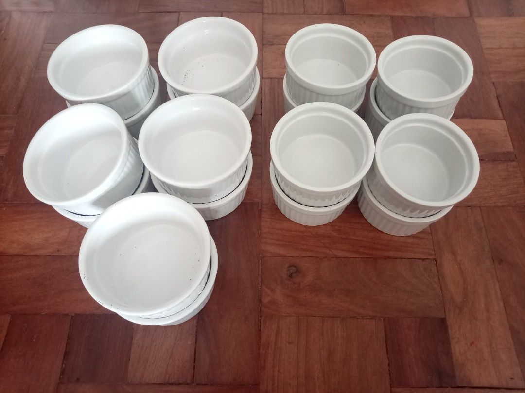 Set of 10 White Ceramic Ramekins (Category: Bakeware) located in Makati City. Submitted by giovandbertha1 (Listing ID 1447973201, Image 1). Description: - Set of 12 white ceramic ramekins - Stackable design for convenient storage - Ideal for baking individual desserts like creme brulee and souffles - Also perfect for serving dips, sauces, and condiments.