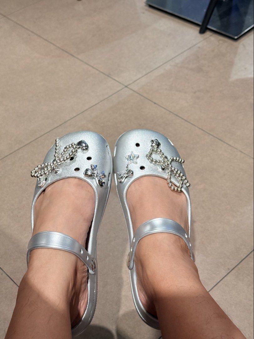 Silver clogs with charms (Category: Flats & Sandals) located in Pasay City. Submitted by sandybuggy (Listing ID 1447886029, Image 3). Description: 25.5cm .