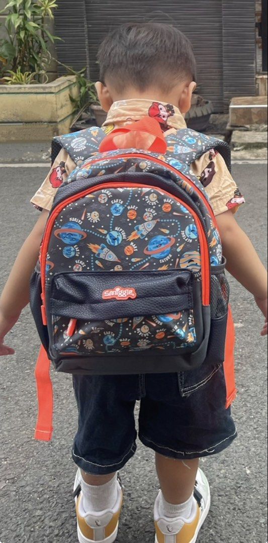 Smiggle Space Rocket Planets Kids Backpack (Category: Babies & Kids Fashion) located in Cainta. Submitted by CeeNeedsToDeclutter (Listing ID 1448000407, Image 1). Description: Smiggles Kids Backpack (small) Perfect for 1-3 y/o Condition: Used. RFS: Not using anymore Loc: Cainta MOD: Lalamove/Grab c/o buyer MOP: Bank transfer or COD via courier For pick up only / No orange app checkout.