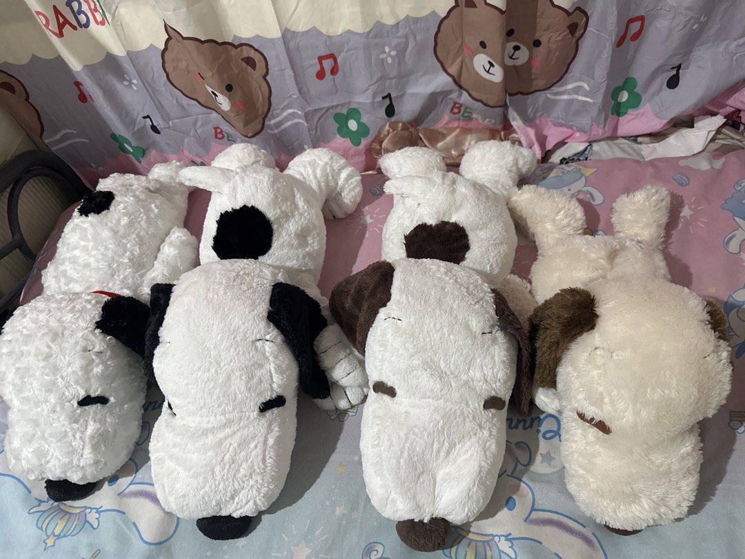 Snoopy Plush Toys - Various Sizes and Styles (Category: Plushies & Soft Toys) located in Pasay City. Submitted by otaku_shop_by_nanami.chan (Listing ID 1447936584, Image 1). Description: Pm lng po Sold per piece / Size: 50cm & 70cm MOD: Gcash or Lalamove abono - Assorted Snoopy plush toys available. - Features Snoopy with red or blue collars. - Soft and cuddly material. - Available in black-eared/spotted or brown variations. - Ideal for Snoopy fa